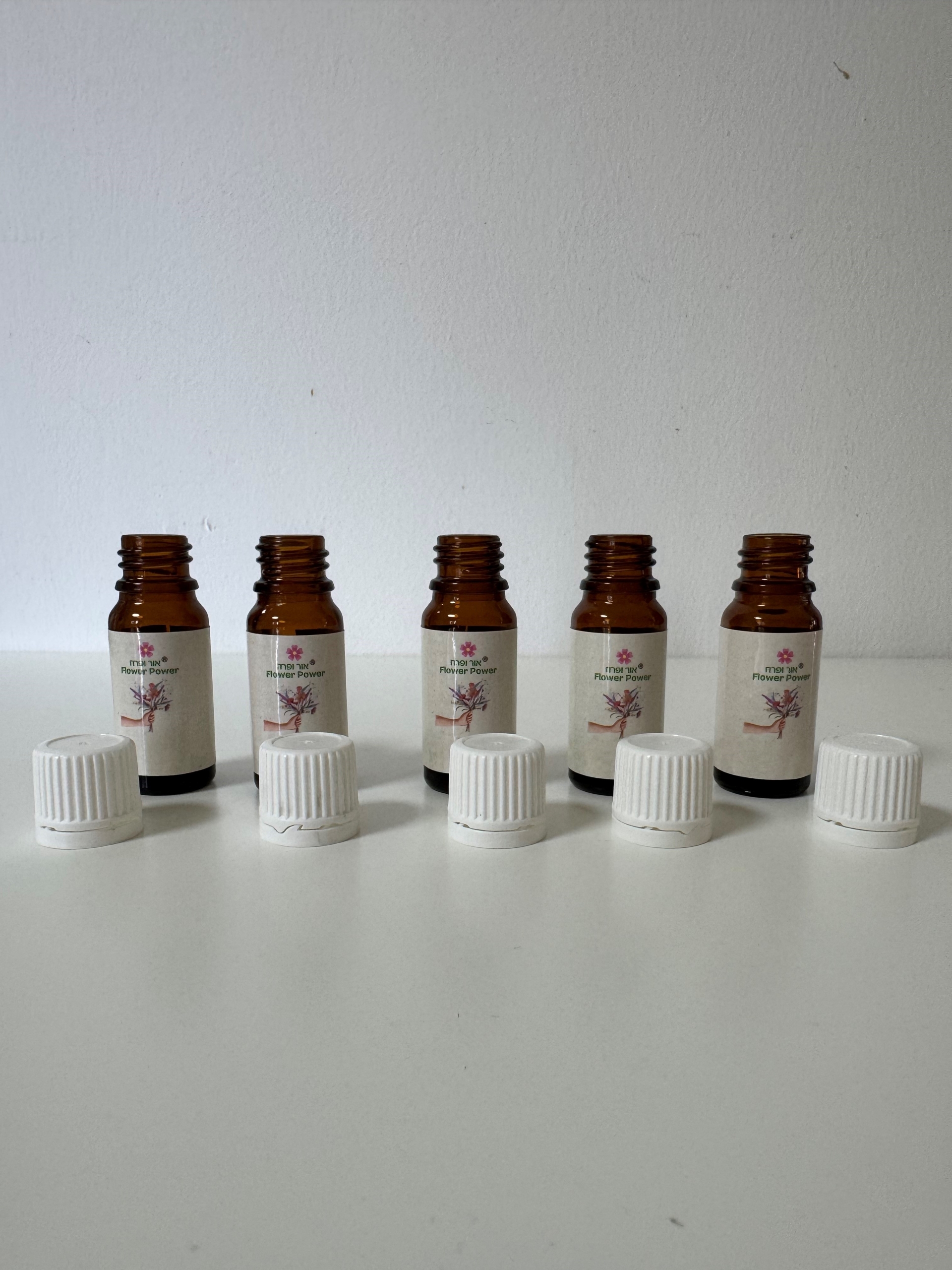 בקבוקי זכוכית לתמציות פרחים